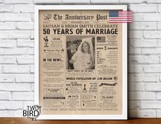 an old newspaper advertises the 50th anniversary of susan and bran smith, in front of a brick wall