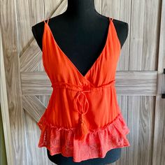 Nwt Bright Orange Colored Camisole Crisscross Back Adjustable Straps Lace Bottom Trim Very Cute Blouse Size Small Spring Vacation Tops With Straps, Spring V-neck Tank Top With Straps, Vacation Tank Top With Crisscross Straps, Spring Crisscross Strap Tank Top, Summer V-neck Tops With Straps, Chic Beach Tank Top With Crisscross Straps, Summer V-neck Tank Top With Straps, Beach V-neck Cotton Camisole, V-neck Tank Top With Straps For Summer