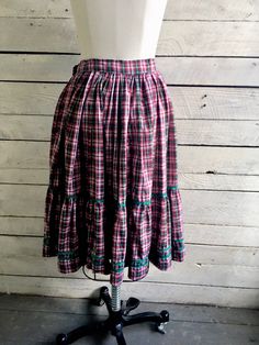 "50s red green plaid peasant skirt 2 tiers with green rick rack trim Full circle skirt Handmade Waist 26\" Length 25\" Width at hem 166\" (measured flat and doubled) Condition - very good vintage" Plaid Tiered Skirt With Ruffles, Plaid Tiered Ruffled Skirt, Plaid Ruffled Cotton Skirt, Plaid Cotton Skirt With Ruffles, Vintage Green Tiered Skirt, Vintage Plaid Cotton Skirt, Hair Grower, Peasant Skirt, Peignoir Sets