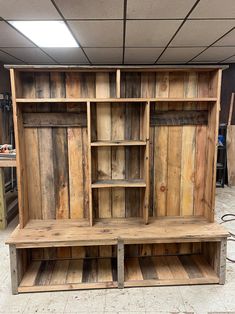 a large wooden shelf with shelves on it