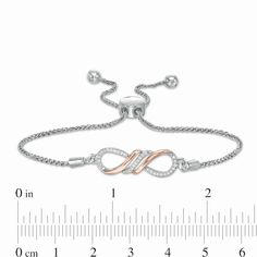 With eye-catching sparkle, this diamond infinity bolo bracelet draws all the right kinds of attention. Crafted in sterling silver and 10K rose gold, this entrancing style features a flame-inspired center design of polished rose gold ribbons highlighting a curved row of diamonds. Additional diamonds line silver loop details to complete this infinity symbol-shaped look. Radiant with 1/15 ct. t.w. of diamonds and a brilliant buffed luster, this wheat chain bracelet adjusts up to 9.5 inches in lengt Rose Gold Infinity Jewelry With Diamond Accents, Adjustable Infinity Fine Jewelry, Adjustable Rose Gold Jewelry With Diamond Accents, Rose Gold Ribbon, Bolo Bracelet, Rose Bracelet, Infinity Symbol, Gold Ribbons, Bracelet Clasps