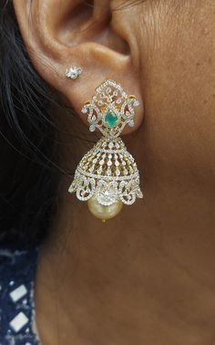 18 karat gold '4 in 1' detachable diamond jhumkas - diamond dangle earrings with color stones & south sea pearls
  width of the jhumka : 0.90 inches
  this product has inter changeable stones in the earrings
  
  note: only the front side has diamonds as shown in the picture, the back part of the jhumka which is not visible from the front is only gold without diamonds  

enhance your elegance with 18 karat gold diamond jhumkas    indulge in luxury with these exquisite 18 karat gold '4 Diamond Jhumkas, India Gift, Color Stones, Diamond Dangle Earrings, Gold Jewelry Indian, South Sea Pearls, Sea Pearls, South Seas, Screw Back Earrings