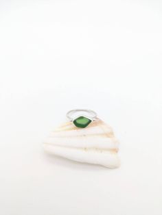 US size 8 | UK Size R 1/2 A gorgeous piece of green Cornish sea glass set in sterling silver, with a dainty band width of 1.5mm and small bead detailing. This ring is set in sterling silver, but the back is not filled in with silver. Packaged in a Yemaya cotton pouch it's the perfect gift or treat for yourself! Please note this is a piece of hand collected sea glass & therefor is not perfectly smooth & has some imperfections which add to its charm! On sale - reduced from £42 to £22 Sea Glass Ring, Dainty Band, Cotton Pouch, Glass Ring, Green Sea, Glass Rings, Beach Glass, Ring Sterling Silver, Glass Set