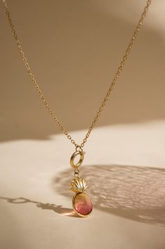 This stunning necklace is perfect for you summer and beach vacation. The chain is handcrafted using 18k gold plated recycled brass. This beautiful pineapple charm is handcrafted using beautiful multicolored tourmaline on 18k gold plated recycled brass. You can slip this charm on a chain or a bracelet and wear it with your summer outfits. The necklace is adjustable from 16 to 19 inches. The extender is attached to the necklace itself. This piece of jewelry is handcrafted by skilled artisans. Pineapple Jewelry, Fruit Necklace, Jewelry Summer, Hippie Necklace, Tourmaline Stone, Summer Necklace, Tropical Fruit, Stunning Necklace, Summer Jewelry