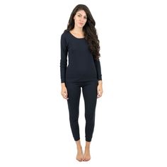 These Womens Two Piece Cotton Pajamas are simple yet stylish for all those comfy occasions. Each outfit is not only imported, but comes with a two-piece set featuring a long-sleeved shirt with breathable bottoms. Both come with ribbed cuffs at the ankles and wrists that ensure a secure feeling for sleeping or lounging around the house. The implemented tagless labels also protect exposed skin from scratches, easily complementing the overall soft cotton feel. With many solid color designs to choos Comfortable Long Sleeve Lounging Sets, Fitted Cotton Sets For Relaxation, Long Sleeve Lounging Sets For Fall, Fitted Sleepwear For Loungewear In Fall, Comfortable Fall Loungewear Sets, Fitted Fall Sleepwear For Loungewear, Casual Black Sets For Relaxation, Stretch Long Sleeve Loungewear Sets, Solid Crew Neck Sets For Loungewear