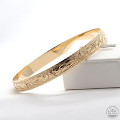 hawaiian bracelet gold Classic Ceremonial Bracelet With Intricate Design, Classic Gold Bracelet With Intricate Design, Engraved Rose Gold Bracelets For Wedding, Classic 14k Gold Bracelets With Intricate Design, Classic Gold Bracelet With Engraving Option, 14k Gold Bracelets With Intricate Design For Anniversary, Engraved Rose Gold Bangle Bracelet, Classic Engraved Bangle For Ceremonial Occasions, Traditional Engraved 14k Gold Bracelet