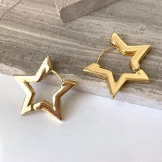 New~ Anthropologie Gold Star Huggie Hoop Earrings In The Shape Of A Star, These Sleek And Simple Earrings Are Great For Everyday! The Huggie Style Hinged Latch Makes Them Easy To Wear. These Would Be A Great Gift! Approx. 1"L, 1"W. Gold-Plated. Nwot. Star Huggie Earrings, Anthro, Preppy Style, Boho Style, Retro, 80s, 90s, Trendy, Brand New Anthropologie Jewelry, Everyday Hoop Earrings, Gold Hoops, Modern, Metallic, Shiny, Holiday, Usa, 4th Of July, Vacation, Patriotic, Shooting Star, Celestial Cute Everyday Earrings, Gold Star Hoop Earrings, Star Gold Jewelry, Gold Everyday Earrings, Star Earrings Hoop, Star Earrings Gold, Trendy Gold Earrings, Gold Star Jewelry, Patriotic Accessories