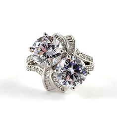 This is a vintage sterling silver ring with two large CZ's in the center approx 3.5 carats each. It is accented with cz diamonds on the outline of the setting as well as around the main stones. This is a used ring in very good condition. This ring is a size 7.75 and is marked SJ 925 on the inside of the band. It weighs approx 10.3 grams. Add this very flashy ring to your collection.  Visit our FAQ section: https://www.etsy.com/shop/KayZees?ref=hdr_shop_menu#more-section If you have any questions please don't hesitate to ask! Vintage Cocktail Ring, Vintage Sterling Silver Rings, Cz Jewelry, Diamond Cocktail Rings, Cz Diamond, Pretty Earrings, Silver Turquoise, Turquoise Sterling Silver, Cocktail Rings