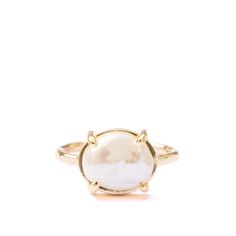 a gold ring with a white pearl in the center