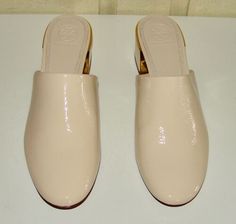 (eBay) Find many great new & used options and get the best deals for NIB Tory Burch size 8 new cream Juliana naplak leather 45 mm mules #49709 at the best online prices at eBay! Free shipping for many products! Luxury Cream Mules, Elegant Patent Leather Block Heel Mules, Formal Patent Leather Mules With Block Heel, Luxury Patent Leather Mules With Round Toe, Classic Cream Mules For Formal Occasions, Elegant Beige Mules For Office, Luxury Beige Mules For Evening, Luxury Beige Evening Mules, Luxury Beige Mules For Formal Occasions