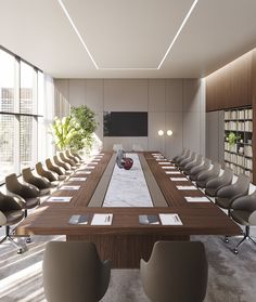 a large conference table with chairs around it