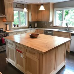 a large kitchen island with a bowl on it