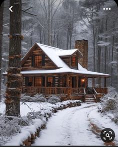 a log cabin in the woods with snow on the ground