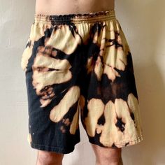 Vintage y2k Champion reverse tie dyed drawstring shorts. These shorts had some discoloration and have been reworked with a unique tie dye look. There are no holes and the drawstring is in tact and working. Marked XL. Waist: max 44 inches Length: 20 inches * Custom clothing and dye work upon request, more items can be viewed on instagram @r.e.e.e.gan or at shopreeegan.com * Use code ETSY on shopreeegan.com for 10% off at checkout! Hand Dyed Tie Dye Cotton Bottoms, Festival Tie-dye Hand-dyed Bottoms, Festival Tie-dye Hand Dyed Bottoms, Relaxed Fit Tie-dye Hand Dyed Bottoms, Relaxed Fit Tie Dye Bottoms, Hand Dyed Tie Dye Bottoms For Festival, Tie Dye Bottoms For Festivals, Hand Dyed Cotton Summer Bottoms, Hand Dyed Cotton Bottoms For Summer