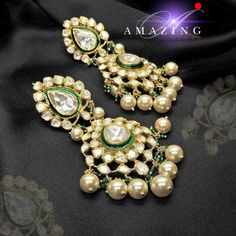 Moissanite and Swarovski Pearls with Green Enamel Earring | Indian Wedding Jewelry | Indian Moissanite Polki Earring| Statement Earring Material : Silver Gemstone: Moissanite, Swarovski, Green Enamel Stone colour: Uncut Polki Primary colour: Gold Size-Length: 85mm Width: 40mm Closure : Screw back and Clips Silver Intricate, hand crafted, Pure Silver Polki Earrings, studded with high quality Moissanite and Swarovski Pearls with Green Enamel Earring comes with screw back and clips, made in 92.5 si Luxury Green Diamond Earrings For Wedding, Luxury Rose Cut Diamond Chandelier Earrings For Wedding, Elegant Danglers With Stone Work For Reception, Elegant Kundan Bridal Earrings For Wedding, Elegant Bridal Chandbali Meenakari Earrings, Elegant White Kundan Earrings, White Meenakari Chandelier Earrings, Elegant Meenakari Dangle Danglers, Elegant White Meenakari Chandelier Earrings