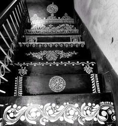 black and white photograph of stairs with intricate designs