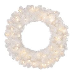 a white wreath with lights on it