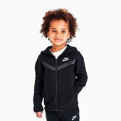 They're the reigning champion of the playground. Ensure they can rule in comfort and style with the easy-to-mix-and-match Kids' Toddler Nike Tech Fleece Full-Zip Hoodie and Joggers Set. Features: Soft, cozy Tech Fleece material offers lightweight warmth Futura branding for an athletic vibeÂ Jacket: Secure banded trim and front zip closure for stay-put wear, sporty raglan sleeves, stylish chevron detail, and an attached hood with funnel neck shields from elements Joggers: Classic tapered silhouet Tech Fleece Outfit, Fleece Outfit, Hoodie And Joggers, Kids Sportswear, Nike Tracksuit, Toddler Nikes, Adidas Tracksuit, Joggers Set, Nike Tech Fleece