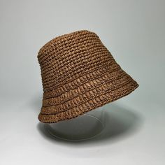 This hat is made of raffia. Raffia is palm leaves. Also, in this hat you will not be hot even on a summer day, because it is made of natural raw materials. Panama is made in boho style - you will be in trend! Suitable for head size 55-56 cm. Brown Woven Fedora Straw Hat, Brown Straw Fedora, Beige Straw Beach Hat, Brown Straw Fedora Hat, Brown Fedora Straw Hat, Casual Wide Brim Palm Leaf Hat, Bohemian Short Brim Boater Hat, Bohemian Palm Leaf Boater Hat With Short Brim, Brown Woven Straw Hat