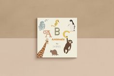 the children's book has animals and letters on it