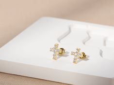 Dainty Cross Stud Earrings ❤️ Gold Tiny Cross Earrings, Minimalist Earrings, Christian Gift for Her, Cubic Zirconia, 925 Sterling Silver, Gold Plated Add a touch of elegance and faith to your jewelry collection with our Dainty Cross Stud Earrings. These stunning earrings are perfect for any occasion, whether you're dressing up for a special event or adding a bit of sparkle to your everyday look. Crafted from high-quality 925 sterling silver and plated with gold, these tiny cross earrings feature Silver Cross Earrings, Cross Stud Earrings, Cross Earrings Studs, Tiny Cross, Christian Gifts For Women, Religious Christmas, Earrings Minimalist, Cross Earrings, Sterling Silver Cross