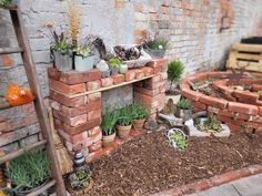 a brick wall with potted plants on it