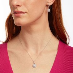 Satisfy her desire for sophisticated sparkle with this cushion-shaped multi-diamond doorknocker-style pendant and drop earrings set. Crafted in cool 10K white gold Each doorknocker-style design showcases a cushion-shaped composite of round diamonds sparkling in an open diamond-lined frame. Polished loops connect the drops to the linear bail and ear wires, each shimmering with diamonds. The pendant suspends along an 18.0-inch rope chain that secures with a spring-ring clasp. These earrings secure Fine Jewelry With Cushion Cut Pave Setting, Fine Jewelry Cushion Cut With Pave Setting, Fine Jewelry With Cushion Cut Diamond Accents, Diamond Frame, Peoples Jewellers, Ear Wires, Rope Chain, Showcase Design, Spring Rings