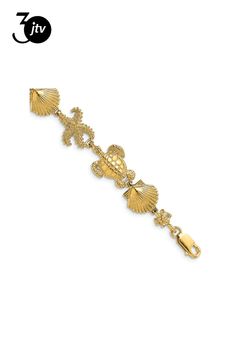 14k yellow gold polished and textured turtle, shell and starfish link bracelet. Measures approximately 7/16 of an inch in width and has a lobster claw clasp. Cubic Zirconia Bracelet, Turtle Shell, Yellow Gemstones, Moissanite Necklace, Cubic Zirconia Earrings, Fine Jewelry Bracelets, Zirconia Earrings, Pearl Gemstone, Gold Polish