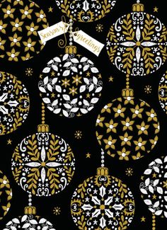 christmas ornaments with gold and white designs on black