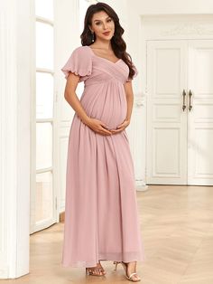 Celebrate your next special occasion by wearing this stunning chiffon A-line maternity dress featuring short flutter bubble sleeves, a v-neck, and pleating throughout, adding glamor to this classic look with a layered silhouette. A tie-back and cinched waist accentuate your baby bump in chic style. Fit: Please refer to size chart. Length: Floor length. Sleeve Style: Short sleeves. Closure: It is concealed a zipper up the back. Undergarments: It is not padded, with lining. Fabric:The garment comp Chiffon Maternity Dress, Tulle Maternity Dress, Formal Maternity Dress, Pregnant Wedding Dress, Casual Maternity, Dress Dusty, Baby Bump, Maternity Dress, Style Chic