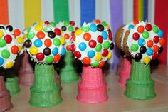 there are some cake pops on top of each other in the shape of candy balls