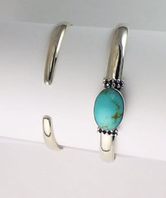 "Sterling Silver Cuff with Turquoise 6mm Cuff equal to fits 7.5 \" bracelet 12mm x 17mm Turquoise 2.25\" wide opening For small wrists or children Priced per piece" Oval Turquoise Cuff Bracelet As Gift, Handmade Turquoise Oval Cuff Bracelet, Turquoise Stone Bracelet, Sterling Silver Cuff, Silver Cuff, Stone Bracelet, Turquoise Stone, Turquoise Bracelet, Cuff