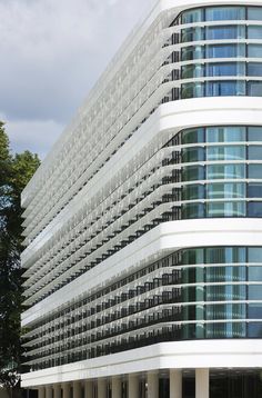 a large white building with lots of windows