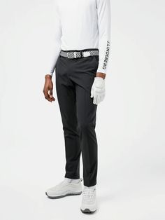 J.LINDEBERG Mens Golf Pants Stretch Moisture-wicking Golf Bottoms, Moisture-wicking Stretch Golf Bottoms, Straight Leg 4-way Stretch Bottoms For Golf, Fitted Black Golf Bottoms, 4-way Stretch Tapered Leg Golf Pants, Sporty 4-way Stretch Pants For Golf, 4-way Stretch Tapered Golf Pants, Fitted Tapered Leg Golf Pants, J Lindeberg