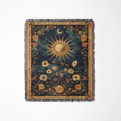 a tapestry hanging on the wall with flowers and a sun in the sky above it