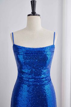 This dress features sequins in a royal blue color and a bodycon silhouette. The top is ruched and the skirt has a ruffle detail. It also has spaghetti straps, a lace-up back, and falls above the knee in length. Item #NP1104 Material: Sequin Color: Royal Blue Silhouette: Bodycon Embellishment: Ruched top, ruffle skirt Neck: Spaghetti straps Back: Lace-up Length: Above knee length Fully lined: Yes Built-in bra: Yes True to size. Made in China. Dresses are usually packed inside out for protection. Hand wash Blue Sequin Spaghetti Strap Dress For Homecoming, Blue Sequin Dress With Spaghetti Straps For Homecoming, Blue Sequin Dress With Spaghetti Straps, Sequence Outfits, Glitter Dress Short, Blue Silhouette, Royal Blue Shorts, Belly Shirts, Hoco Dress