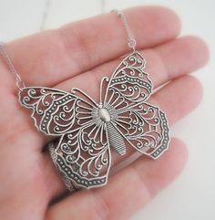 "Vintage Necklace - Silver Necklace - Butterfly Necklace - Filigree Necklace - Butterfly Jewelry - Statement Necklace - handmade jewelry This is such a fabulous necklace! A gorgeous silver plated filigree butterfly hangs from a pretty silver plated chain. So very feminine. Chloe says, \"Wear it and feel fabulous!\" The butterfly measures 2\" wide and 1 1/2\" long. You can choose the length you would like at checkout. Thanks for visiting Chloe's" Unique Nickel Free Necklace For Wedding, Silver Butterfly Jewelry For Jewelry Making, Whimsical Handmade Necklaces For Weddings, Bohemian Handmade Necklaces For Anniversary, Handmade Bohemian Necklace For Anniversary, Bohemian Handmade Necklace For Anniversary, Handmade Silver Whimsical Jewelry, Silver Decorative Jewelry Gift, Whimsical Handmade Silver Jewelry