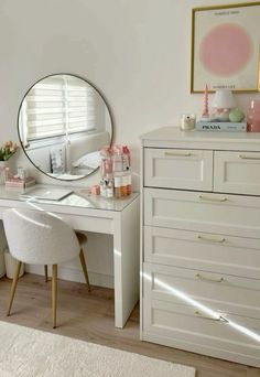 a white desk with a mirror on top of it