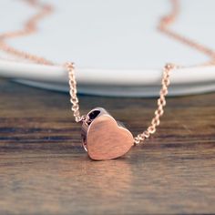 Rose Gold Heart Necklace, Cremation Jewelry, Ash Jewelry, Heart Cremation Pendant, Urn Necklace For Ashes, Cremation Necklace This is the perfect gift and a unique way to carry your loved ones close to your heart! ♥ this listing features: * a solid stainless steel urn charms measure 14 mm x 12 mm *Rose Gold Flat cable chain. *choose length of chain please choose necklace length from the drop down menu Rose Gold Heart Necklace With Adjustable Chain, Anniversary Rose Gold Heart Beads Necklace, Rose Gold Heart Pendant Charm Necklace, Rose Gold Heart Cut Jewelry With Heart Beads, Heart-shaped Rose Gold Necklace Gift For Mom, Rose Gold Heart Charm Necklace As Gift For Her, Rose Gold Heart Charm Necklace Pendant, Rose Gold Heart Charm Necklace For Gift, Rose Gold Heart Necklace With Heart Charm As Gift