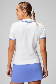 Classic Pique Short-Sleeve Polo Fabletics white female Activewear >> Womens >> Tops >> Short Sleeve T-Shirts >> Short-Sleeve Top regular Everyday/Golf/Tennis Classic short-sleeve polo. Fitted Tennis Tops, Sporty Fitted Tennis Tops, Fitted Sporty Tops For Tennis, Sporty Fitted Tops For Tennis, Moisture-wicking Fitted Top For Tennis, Fitted Go-dry Tops For Golf, White Fitted Tennis Top, Fitted White Golf Top, White Fitted Golf Tops