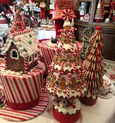 several christmas themed cupcakes are on display