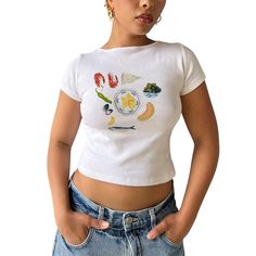 PRICES MAY VARY. Material: Graphic baby tees for women are made of 95% cotton and 5% spandex, lightweight, skin-friendly, soft, stretchy, breathable, comfortable to wear. Trendy baby tees for women teen girls 2024. Features: Y2k tops, short sleeve, round neck, fruit or food pattern print aesthetic tops, slim fit, crop tops, cute graphic tees for women teen girls, going out tops for women, grunge clothes for casual streetwear. Very fashion and attractive. Occasion: Graphic tees y2k, coastal summe Floral Clothing, Graphic Crop Top, Aesthetic Streetwear, Baby Graphic Tees, Women Y2k, Y2k Baby Tee, Aesthetic T Shirts, Crop Top Tees, Casual Vest