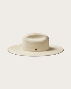 Born from earth and hand woven by artisans. The Toluca is a medium depth cattleman crown with an oversized brim treated with medium stiffness for increased structure and shape. Directly from the earth alongside our artisan partners, we bring you handmade quality you can trust. Elegant Hat With Structured Crown In Natural Color, Elegant Natural Hat With Structured Crown, Handwoven Flat Brim Fedora In Toquilla Straw, Handwoven Fedora With Flat Brim In Toquilla Straw, Handwoven Toquilla Straw Fedora With Flat Brim, Natural Handwoven Fedora With Curved Brim, Natural Fedora With Handwoven Curved Brim, Natural Straw Hat With Structured Crown For Vacation, Vacation Straw Hat With Structured Crown In Natural Color