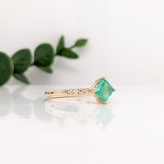 This bright glowing green ring features a 0.52-carat Asscher cut emerald with natural earth-mined diamonds, all set in solid 14K gold. This ring can be a beautiful May birthstone gift for your loved ones! This ring is made with solid 14K Gold and naturally Earth-mined SI / G-H diamonds. As listed, this ring is ready to ship. If you're interested in purchasing this setting with a different center stone please message us! Designer Silver Jewellery, Green Emerald Ring, Green Ring, Green Rings, Jewelry Showcases, May Birthstone, Asscher Cut, Birthstone Gifts, Green Emerald