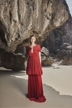 This dress features an intricately-crafted silhouette with off-the-shoulder, balloon-like sleeves and a floor-length, chiffon skirt. This timeless, statement-making style will look beautiful at any special occasion. Elegant Off-shoulder Dress With Flowy Skirt, Elegant Red Dress With Voluminous Skirt, Voluminous Maxi Dress For Evening, Cocktail Maxi Dress With Gathered Sleeves, Elegant Floor-length Maxi Dress With Voluminous Skirt, Red Evening Dress With Gathered Sleeves, Elegant Red Dress With Flowy Skirt, Elegant Billowy Off-shoulder Dress, Elegant Off-shoulder Billowy Dress