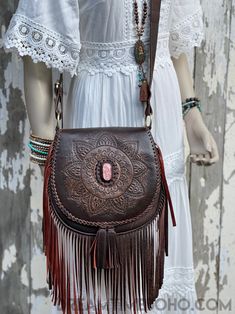 Show your personality with the Pink Stone Mandala shoulder/crossbody boho bag. The Pink Stone Mandala hand carved leather fringed boho bag is a stunning piece. Hand tooled with a pink feature stone in centre, a must for any bohemian Goddess. Handmade Genuine soft lush Leather Magnetic Close on front flap, zipper close inside under flap. Inside bag- Zip pocket and 2 open pockets Lined Measurements - Approx W26cm x H26cm Strap length Approx - 124cm 2 Colours available - Antique Brown & Black Featu Stone Mandala, Inside Bag, Mandala Stones, Black Features, Pink Colour, Boho Bag, Leather Fringe, Pink Stone, The Pink