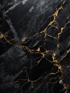 black marble with gold veining on it