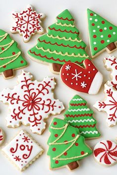 decorated christmas cookies on a white surface