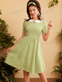 This vintage floral color block dress features a charming green cottagecore design with contrasting colors. Perfect for a sunny day out, it offers a stylish and unique look that will turn heads. Made with high-quality materials, it provides both comfort and fashion. Color : Green Style : Cute Details : Zipper Type : A Line Pattern Type : Gingham, Colorblock, Geometric Sleeve Length : Short Sleeve Neckline : Peter Pan Collar Sleeve Type : Puff Sleeve Waist Line : High Waist Hem Shaped : Flared Le Casual A-line Vintage Dress For Garden Party, Green Mini Dress For Picnic, Spring Preppy Knee-length Dress, Casual Green Knee-length Vintage Dress, Green Spring Picnic Dress, Green Casual Dress For Picnic, Casual Green Dress For Picnic, Green A-line Vintage Summer Dress, Green Midi Vintage Dress For Spring