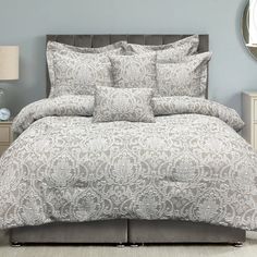 the comforter is neatly made and ready to be used in this bedding set